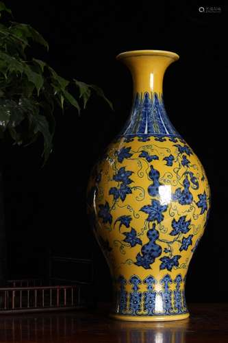 YELLOW GROUND BLUE WHITE FOLIAGE VASE