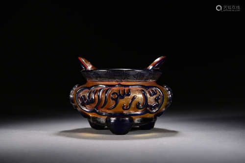 AN INSCRIBED GLASS THREE-LEGGED CENSER