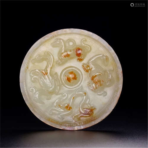 A Chinese Carved Jade Mirror