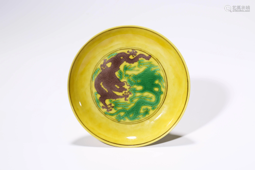 A Yellow Ground Green and Aubergine Enamelled Dragon