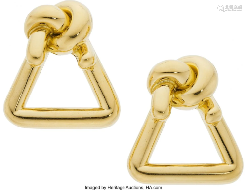 11009: Gold Earrings, Cartier The 18k gold knot earrin