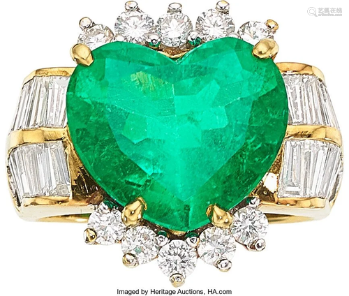 11016: Emerald, Diamond, Gold Ring The ring features a