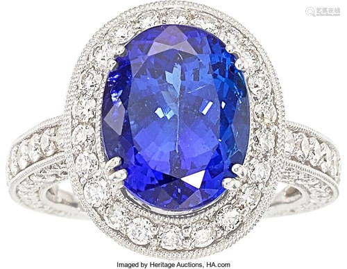 11061: Tanzanite, Diamond, White Gold Ring The ring fe