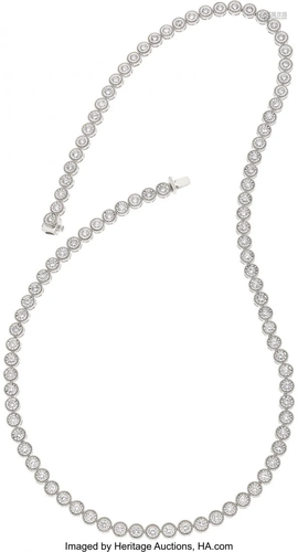 11058: Diamond, White Gold Necklace The necklace featu