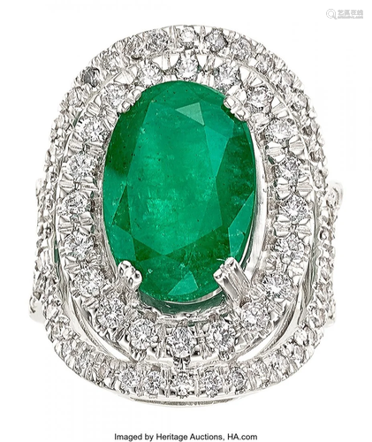 11104: Emerald, Diamond, White Gold Ring The ring feat