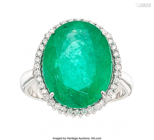 11132: Emerald, Diamond, White Gold Ring The ring feat