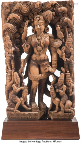 78250: An Indian Wood Carving, 19th century 27-1/4 x 17