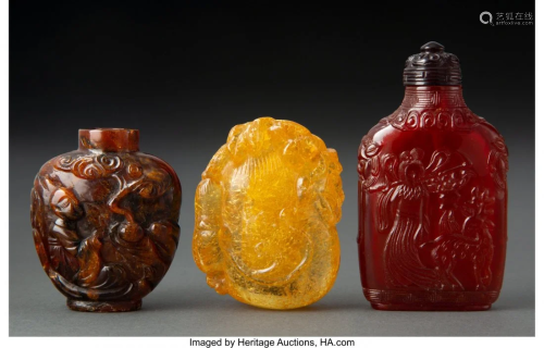 78025: A Group of Three Chinese Carved Amber Snuff Bott