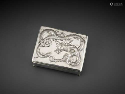 A SILVER REPOUSSE ‘DRAGON’ BOX AND COVER, WANG HING, LATE QING TO REPUBLIC