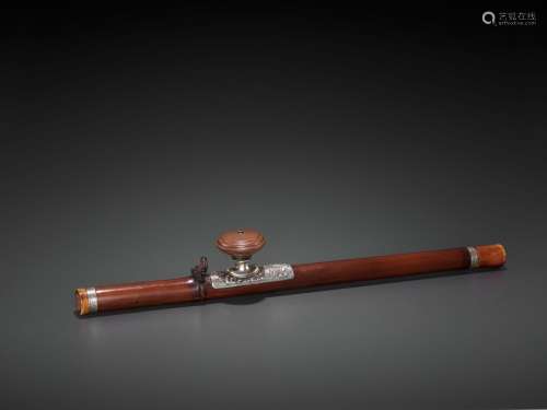 A BAMBOO OPIUM PIPE WITH IVORY, SILVER AND YIXING CERAMIC FITTINGS, LATE QING TO REPUBLIC