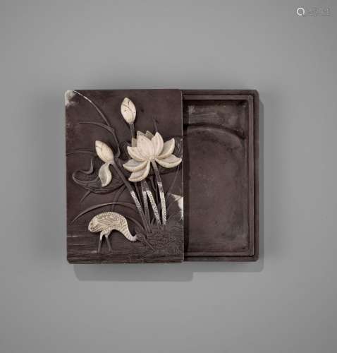 A DUAN ‘CRANE AND LOTUS’ INKSTONE AND COVER, QING