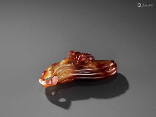 A FINE AGATE ‘MELON AND BOY’ GROUP, QING