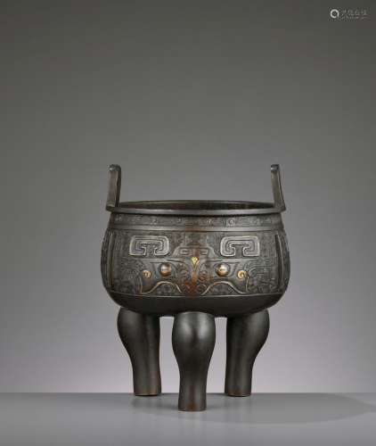 A PARCEL-GILT ARCHAISTIC BRONZE TRIPOD CENSER, MING