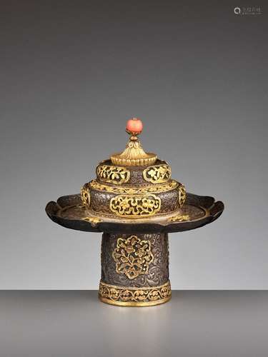 A PARCEL-GILT SILVER REPOUSSÉ STEM-BOWL AND COVER, QING