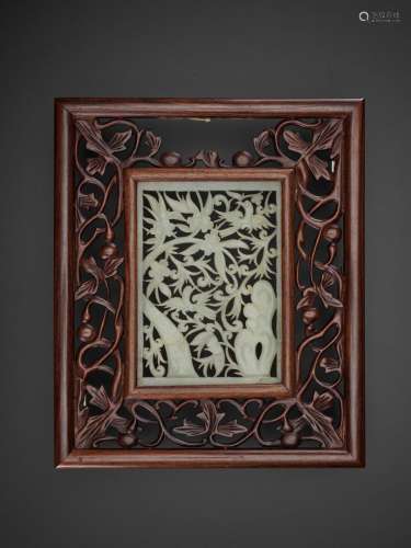 AN OPENWORK JADE ‘BIRDS AND FLOWERS’ PLAQUE, MING DYNASTY