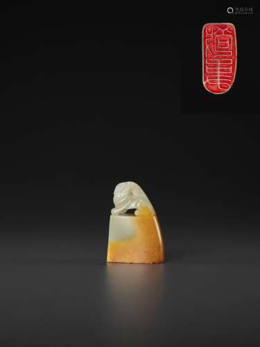 A PALE CELADON AND AMBER JADE ‘BUDDHIST LION’ SEAL, MID-QING TO REPUBLIC
