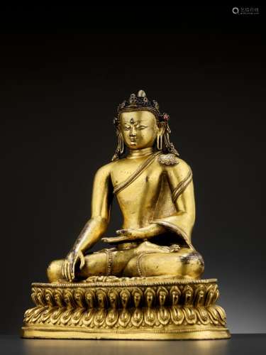 A GILT COPPER-ALLOY FIGURE OF A CROWNED BUDDHA, MALLA, 14TH - 15TH CENTURY