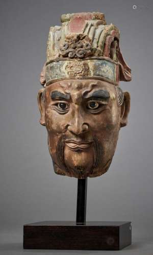 A LARGE PAINTED STUCCO HEAD OF A GUARDIAN KING, SONG TO MING DYNASTY