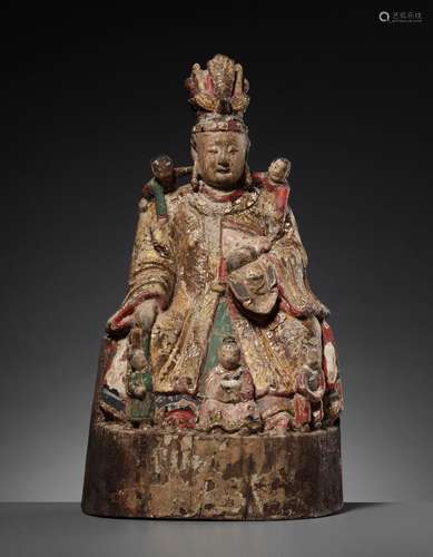 A RARE LACQUERED WOOD STATUE OF SONGZI GUANYIN BREASTFEEDING A CHILD, DATED 1633