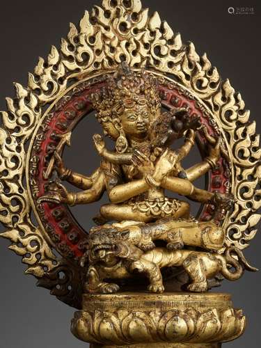 A GILT-BRONZE FIGURE OF GUHYASAMAJA IN A GILT-BRONZE SHRINE