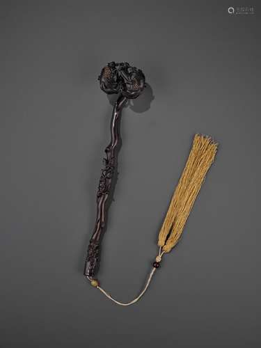 A CORAL-INLAID AND OPENWORK ZITAN ‘POMEGRANATE’ RUYI SCEPTER, QING