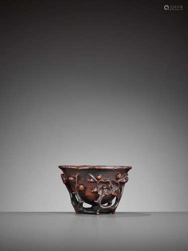 A HUANGHUALI ‘PRUNUS’ LIBATION CUP, EARLY QING DYNASTY