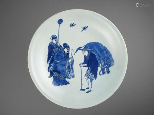 A BLUE AND WHITE ‘BESTOWING THE EDICT’ CHARGER, KANGXI MARK AND PERIOD