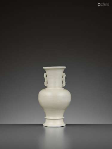 A DING-TYPE IVORY-GLAZED SOFT-PASTE VASE, YUAN TO MING
