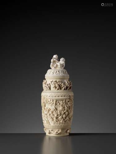 AN EXCEPTIONAL OPENWORK AND RETICULATED IVORY ‘HUNDRED BOYS’ VASE AND COVER, LATE QING TO REPUBLIC