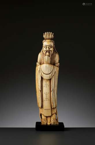 A LARGE IVORY FIGURE OF AN IMMORTAL, LATE MING DYNASTY