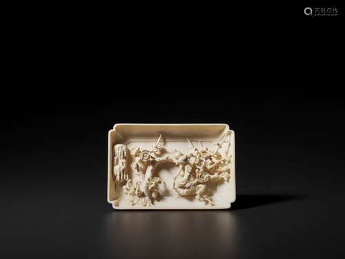 A CARVED IVORY BASE WITH A HIDDEN ‘BIRDS AND PRUNUS’ SCENE, QING