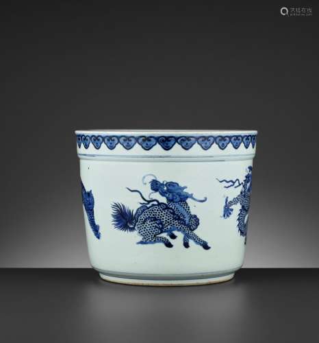 A MASSIVE BLUE AND WHITE ‘FIVE MYTHICAL BEASTS’ JARDINIERE, QING DYNASTY