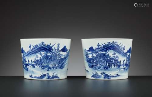 A PAIR OF BLUE AND WHITE ‘LANDSCAPE’ JARDINIERES, QING DYNASTY