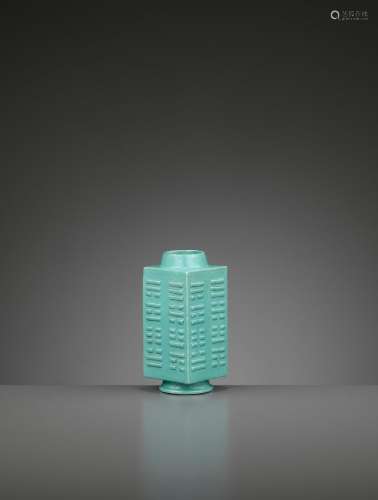 A MINIATURE TURQUOISE-GLAZED CONG WITH EIGHT TRIGRAMS, QING
