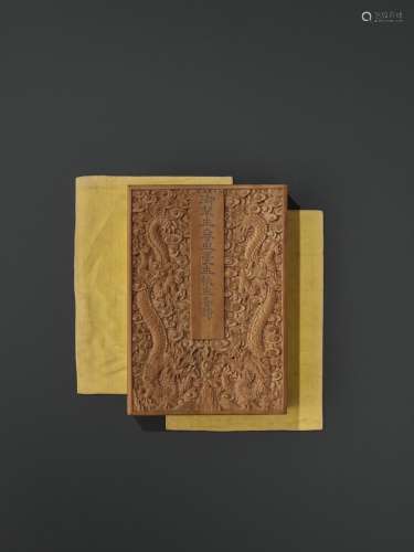 AN IMPERIAL POETRY ALBUM BY YU MINZHONG (1714-1779), WITH CARVED SANDALWOOD COVERS, QIANLONG