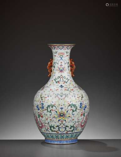 A FAMILLE ROSE ‘LOTUS AND DRAGONS’ VASE, LATE QING TO REPUBLIC