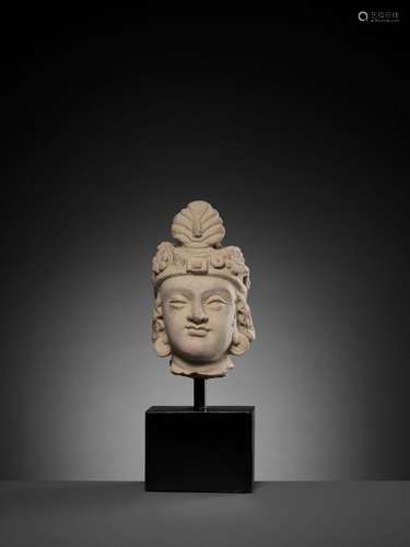 A TERRACOTTA HEAD OF MAITREYA