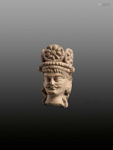 A TERRACOTTA HEAD OF A BODHISATTVA, 3RD-5TH CENTURY