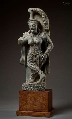 A SCHIST FIGURE OF A YAKSHI, GANDHARA, 2ND-3RD CENTURY