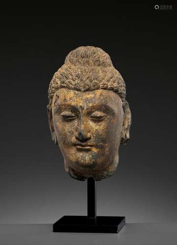 A SUPERBLY CARVED GRAY SCHIST HEAD OF BUDDHA, GANDHARA