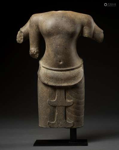 A SANDSTONE TORSO OF A FOUR-ARMED DEITY, ANGKOR PERIOD