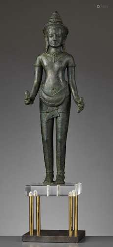 A LARGE AND IMPORTANT BRONZE FIGURE OF AVALOKITESHVARA, ANGKOR WAT PERIOD