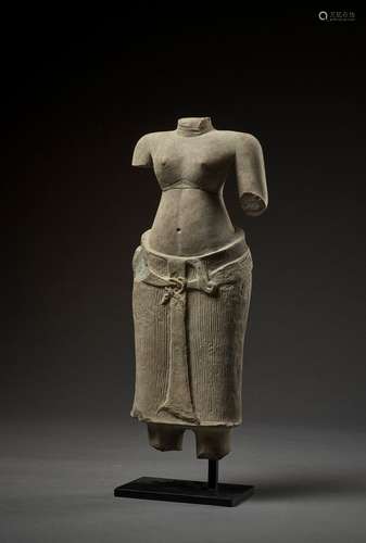 A SANDSTONE TORSO OF UMA, ANGKOR WAT PERIOD, BAPHUON STYLE