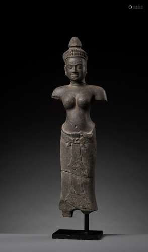 A GRAY SANDSTONE FIGURE OF UMA, ANGKOR PERIOD