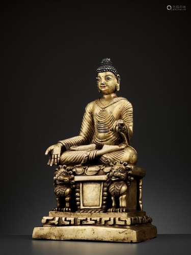 A HEAVY GILT BRONZE ‘KASHMIR REVIVAL’ FIGURE OF BUDDHA SHAKYAMUNI, LATER 18TH- EARLIER 20TH CENTURY