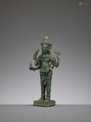 A KHMER BRONZE FIGURE OF AVALOKITESHVARA, ANGKOR PERIOD