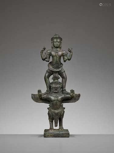 A KHMER BRONZE FIGURE OF VISHNU STANDING ON GARUDA, ANGKOR PERIOD