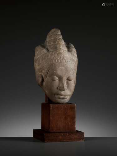 A MON-DVARAVATI SANDSTONE HEAD OF A BUDDHIST DEVOTEE