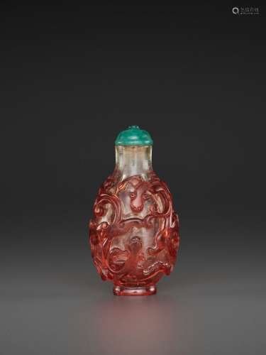 A RUBY-RED OVERLAY TRANSPARENT GLASS ‘CHILONG’ SNUFF BOTTLE, QING DYNASTY