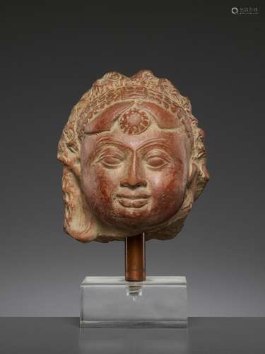 A JAMMU TERRACOTTA HEAD OF A FEMALE DEITY, 6TH-7TH CENTURY